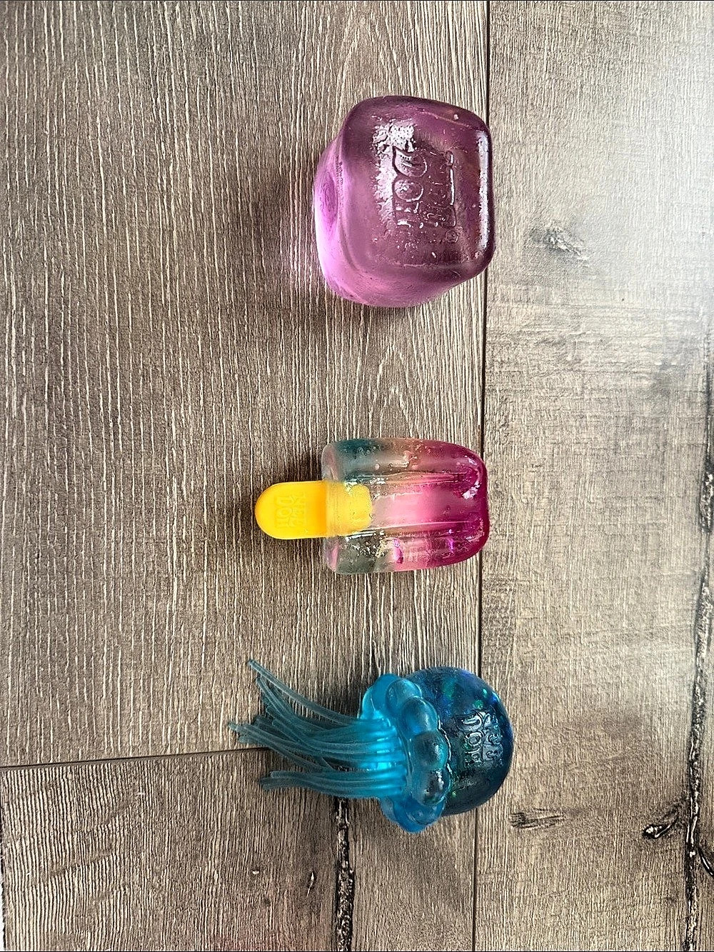 Needoh popsicle squishy, Needoh jellyfish squishy, and Needoh nice cube purple s